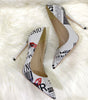 Schuhe mit spitzer Spitze und Pfennigabsatz
