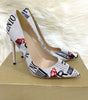 Schuhe mit spitzer Spitze und Pfennigabsatz