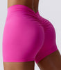 Enge Yoga-Shorts mit tiefem V-Ausschnitt und Falten an der Rückseite der Taille
