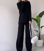 Loose-fit turtleneck knitted set with a long-sleeved top and straight trousers