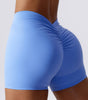 Enge Yoga-Shorts mit tiefem V-Ausschnitt und Falten an der Rückseite der Taille