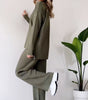 Loose-fit turtleneck knitted set with a long-sleeved top and straight trousers